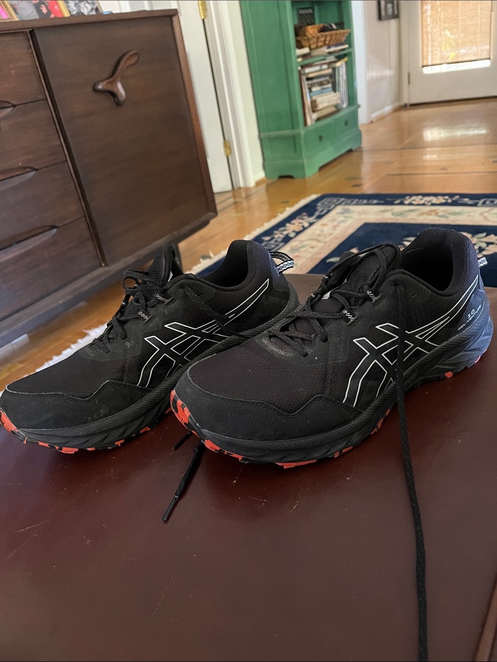 Asics Black Athletic Shoes with Red Camo Outsole